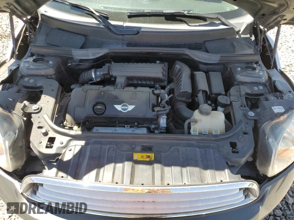 2014 MINI Countryman with VIN WMWZB3C56EWR38919, listed as a Copart auction lot 61385865 with 127,368 mi miles and Salvage title. Bid and sale history available at DreamBid. Image 11.