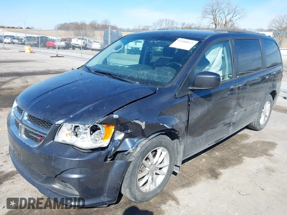 2014 Dodge Grand Caravan SXT with VIN 2C4RDGCG1ER167624, listed as a IAAI auction lot 41888822 with 202,729 mi miles and . Bid and sale history available at DreamBid. Image 2.