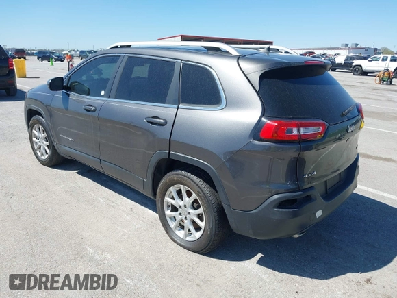 2014 Jeep Cherokee Latitude with VIN 1C4PJMCS2EW137767, listed as a IAAI auction lot 42052071 with 165,300 mi miles and . Bid and sale history available at DreamBid. Image 3.
