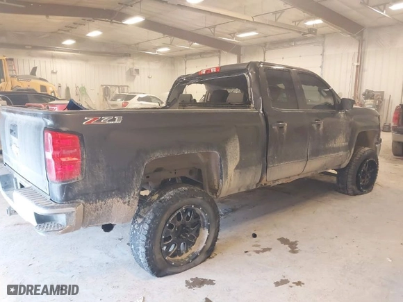 2015 Chevrolet Silverado 1500 LT with VIN 1GCVKRECXFZ354846, listed as a IAAI auction lot 41252244 with 216,467 mi miles. Bid and sale history available at carsss.com. Image 4.