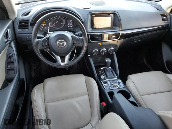 2016 Mazda CX-5 Sport with VIN JM3KE2BY3G0877107, listed as a Copart auction lot 87621635 with 83,093 mi miles and Salvage Title. Bid and sale history available at carsss.com. Image 8.