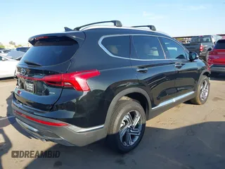2023 Hyundai Santa Fe SEL with VIN 5NMS3DAJ6PH574739, listed as a IAAI auction lot 41968323 with 17,123 mi miles and . Bid and sale history available at DreamBid. Image 4.