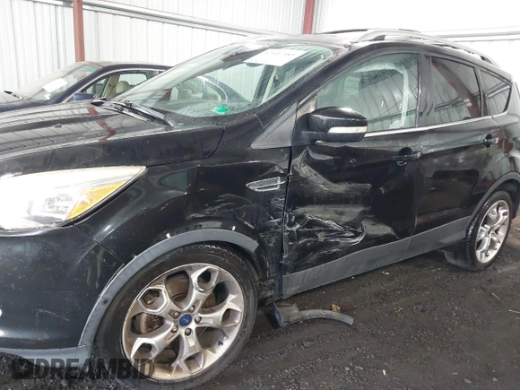 2015 Ford Escape Titanium with VIN 1FMCU9J98FUB00525, listed as a IAAI auction lot 42547989 with 194,040 mi miles and . Bid and sale history available at DreamBid. Image 6.