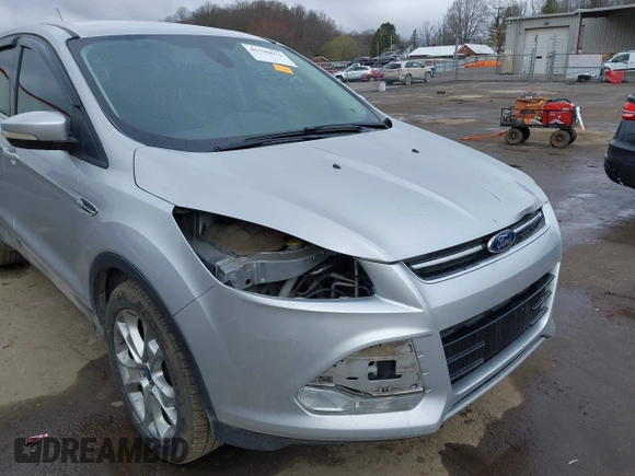 2013 Ford Escape SEL with VIN 1FMCU9H93DUA81448, listed as a IAAI auction lot 41790631 with 176,015 mi miles. Bid and sale history available at carsss.com. Image 6.