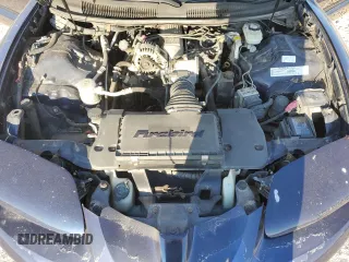 2000 Pontiac Firebird Firebird z VIN 2G2FS22K7Y2145503, wystawiony jako Copart lot #80487434 z przebiegiem 120 386 mil mil oraz Czysty tytuł • Clean title. Historia ofert i sprzedaży dostępna na DreamBid. Obrazek 11.