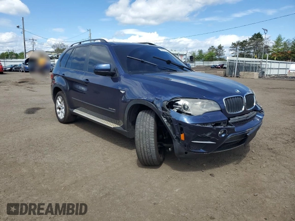 2012 BMW X5 35i with VIN 5UXZV4C56CL754643, listed as a Copart auction lot 55970125 with 150,584 mi miles and Salvage title. Bid and sale history available at DreamBid. Image 4.