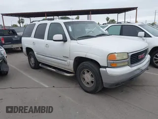 2002 GMC Yukon SLT with VIN 1GKEC13T02R313772, listed as a IAAI auction lot 42131289 with 215,164 mi miles. Bid and sale history available at carsss.com. Image 1.