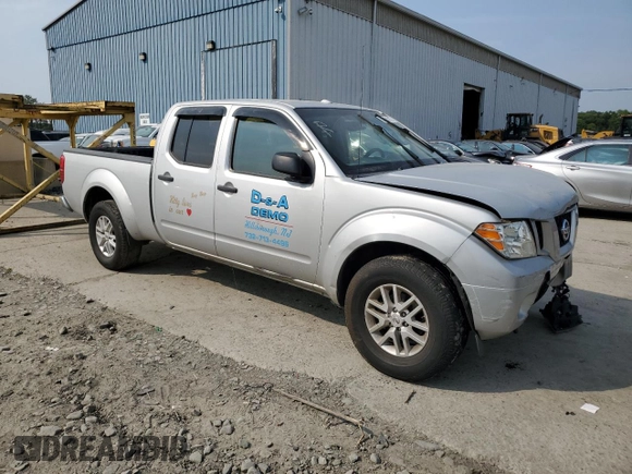 2014 Nissan Frontier SV with VIN 1N6AD0FV1EN734214, listed as a Copart auction lot 59261715 with 114,413 mi miles and Salvage title. Bid and sale history available at DreamBid. Image 4.