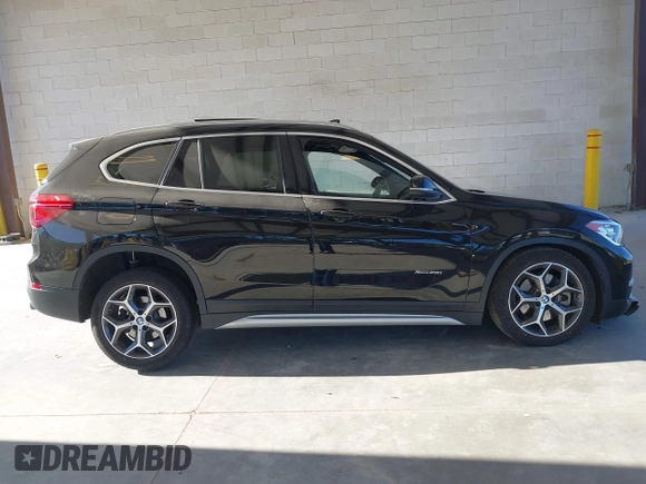 2018 BMW X1 xDrive28i z VIN WBXHT3C35J5L25056, wystawiony jako IAAI lot #42185474 z przebiegiem 62 631 mil mil oraz . Historia ofert i sprzedaży dostępna na DreamBid. Obrazek 13.