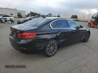 2018 BMW 5 Series 530i with VIN WBAJA5C51JWA38499, listed as a Copart auction lot 49150205 with 59,521 mi miles and Salvage Title. Bid and sale history available at DreamBid. Image 3.