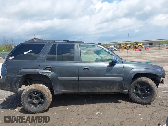 2005 Chevrolet TrailBlazer LT with VIN 1GNDT13S552269402, listed as a IAAI auction lot 42155633 with 242,288 mi miles and . Bid and sale history available at DreamBid. Image 13.