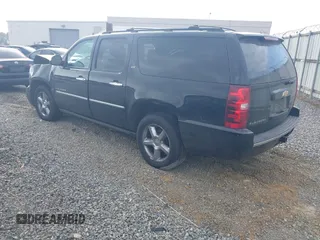 2014 Chevrolet Suburban LTZ with VIN 1GNSCKE05ER105566, listed as a IAAI auction lot 40762562 with 191,055 mi miles and . Bid and sale history available at DreamBid. Image 3.