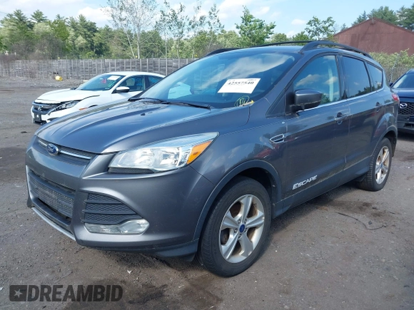 2013 Ford Escape SE z VIN 1FMCU0GX0DUD90385, wystawiony jako IAAI lot #42557540 z przebiegiem 147 529 mil mil oraz . Historia ofert i sprzedaży dostępna na DreamBid. Obrazek 2.