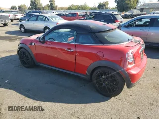 2012 MINI Cooper Coupe with VIN WMWSX1C5XCT163790, listed as a Copart auction lot 73148734 with 144,323 mi miles and Salvage Title. Bid and sale history available at carsss.com. Image 2.