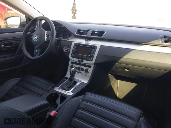 2014 Volkswagen CC Sport with VIN WVWBP7AN5EE508465, listed as a IAAI auction lot 41403844 with 97,445 mi miles and . Bid and sale history available at DreamBid. Image 5.