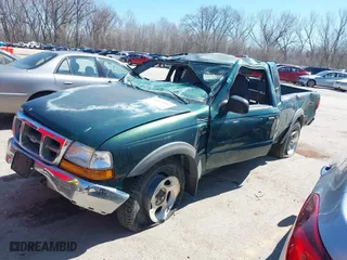 1999 Ford Ranger XLT with VIN 1FTZR15X0XPA00817, listed as a IAAI auction lot 41855947 with 215,786 mi miles. Bid and sale history available at carsss.com. Image 2.