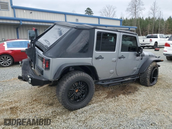 2014 Jeep Wrangler Unlimited Rubicon with VIN 1C4BJWFG7EL197252, listed as a Copart auction lot 44798205 with 115,778 mi miles and Salvage Title. Bid and sale history available at carsss.com. Image 3.