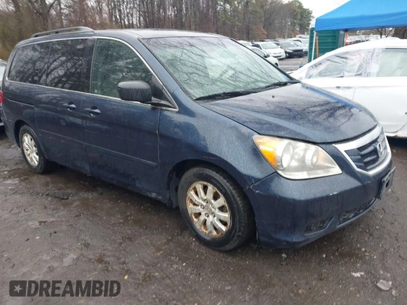 2010 Honda Odyssey EX with VIN 5FNRL3H41AB061674, listed as a IAAI auction lot 41954700 with 115,722 mi miles. Bid and sale history available at carsss.com. Image 1.