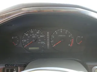 2002 Infiniti G20 Luxury z VIN JNKCP11A12T501940, wystawiony jako Copart lot #74041014 z przebiegiem Nie podano mil oraz Szkody całkowita. Historia ofert i sprzedaży dostępna na DreamBid. Obrazek 9.