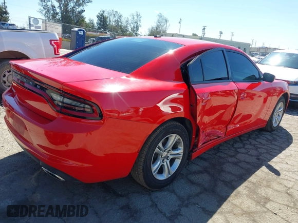 2022 Dodge Charger SXT with VIN 2C3CDXBG1NH212532, listed as a IAAI auction lot 41746271 with 56,011 mi miles and . Bid and sale history available at DreamBid. Image 4.