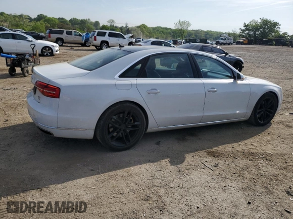 2015 Audi A8 4.0T with VIN WAU32AFD6FN006093, listed as a Copart auction lot 55259555 with 100,838 mi miles and Salvage title. Bid and sale history available at DreamBid. Image 3.