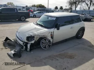 2011 MINI Hardtop with VIN WMWSU3C54BT098857, listed as a Copart auction lot 49888125 with 93,082 mi miles and Salvage Title. Bid and sale history available at DreamBid. Image 1.