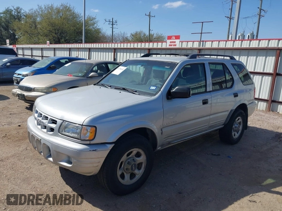 2001 Isuzu Rodeo S with VIN 4S2DM58WX14352481, listed as a IAAI auction lot 41796652 with 162,696 mi miles and . Bid and sale history available at DreamBid. Image 2.