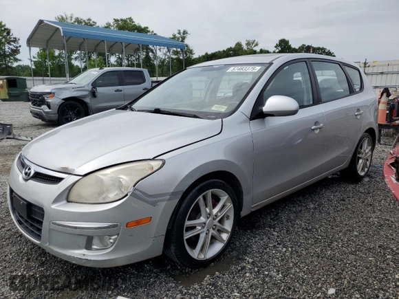 2009 Hyundai Elantra Touring z VIN KMHDC86E29U038194, wystawiony jako Copart lot #57483375 z przebiegiem 218 337 mil mil oraz Szkoda całkowita • Salvage title. Historia ofert i sprzedaży dostępna na DreamBid. Obrazek 1.