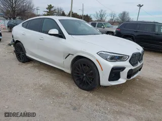 2023 BMW X6 xDrive40i with VIN 5UXCY6C08P9P28397, listed as a IAAI auction lot 41325621 with 66,412 mi miles. Bid and sale history available at carsss.com. Image 1.