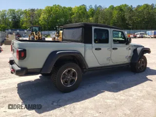 2023 Jeep Gladiator Rubicon с VIN 1C6JJTBG2PL542178, выставлен на аукционе Copart как лот 54684915 с пробегом 24 687 миль миль и Списание • Salvage title. История ставок и продаж доступна на DreamBid. Изображение 3.