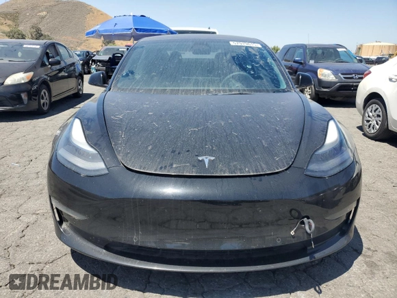 2021 Tesla Model 3 Long Range z VIN 5YJ3E1EB3MF096504, wystawiony jako Copart lot #57919615 z przebiegiem 142 854 mil mil oraz Czysty tytuł • Clean title. Historia ofert i sprzedaży dostępna na DreamBid. Obrazek 5.