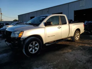 2010 Nissan Titan SE with VIN 1N6BA0CH6AN313367, listed as a Copart auction lot 83491054 with 161,918 mi miles and Salvage Title. Bid and sale history available at carsss.com. Image 1.