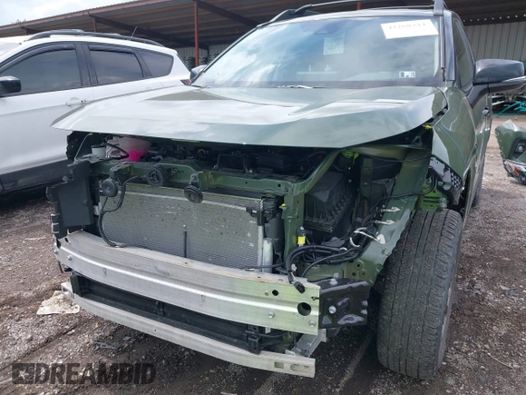 2024 Toyota RAV4 Hybrid LE with VIN 2T3UWRFV4RW219138, listed as a IAAI auction lot 42268211 with 12,423 mi miles and . Bid and sale history available at DreamBid. Image 6.