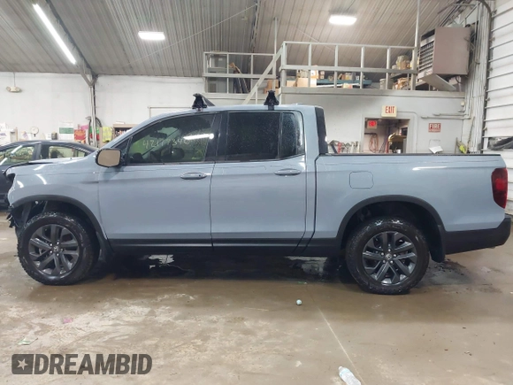 2024 Honda Ridgeline Sport z VIN 5FPYK3F16RB015283, wystawiony jako IAAI lot #42177340 z przebiegiem 7 581 mil mil oraz . Historia ofert i sprzedaży dostępna na DreamBid. Obrazek 14.