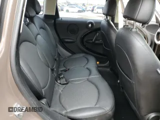 2013 MINI Countryman z VIN WMWZB3C53DWM31457, wystawiony jako Copart lot #55528885 z przebiegiem 137 279 mil mil oraz Szkoda całkowita • Salvage title. Historia ofert i sprzedaży dostępna na DreamBid. Obrazek 10.