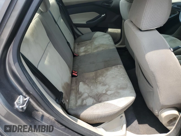 2012 Ford Focus SE z VIN 1FAHP3F22CL431070, wystawiony jako Copart lot #59569925 z przebiegiem 222 295 mil mil oraz Szkoda całkowita • Salvage title. Historia ofert i sprzedaży dostępna na DreamBid. Obrazek 10.
