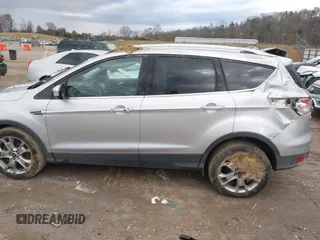 2014 Ford Escape Titanium with VIN 1FMCU9J94EUE51012, listed as a IAAI auction lot 41497105 with 153,031 mi miles. Bid and sale history available at carsss.com. Image 13.