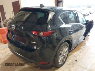 2020 Mazda CX-5 Grand Touring with VIN JM3KFADM3L0742625, listed as a IAAI auction lot 41715580 with 45,562 mi miles. Bid and sale history available at carsss.com. Image 4.