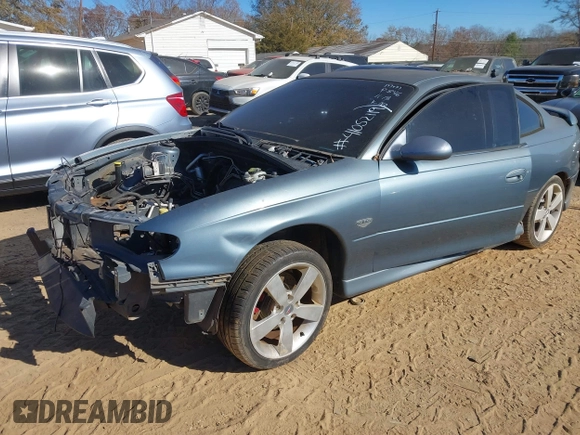 2005 Pontiac GTO z VIN 6G2VX12U45L454630, wystawiony jako IAAI lot #41052119 z przebiegiem Nie podano mil oraz . Historia ofert i sprzedaży dostępna na DreamBid. Obrazek 19.