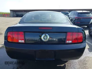 2008 Ford Mustang Deluxe with VIN 1ZVHT80N085138945, listed as a IAAI auction lot 41820988 with 127,880 mi miles. Bid and sale history available at carsss.com. Image 16.