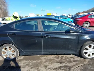 2013 Hyundai Elantra GLS PZEV with VIN KMHDH4AE4DU574977, listed as a IAAI auction lot 41608098 with 116,899 mi miles. Bid and sale history available at carsss.com. Image 14.