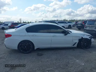 2018 BMW 5 Series 540i with VIN WBAJE5C50JWA95412, listed as a IAAI auction lot 41502258 with 74,150 mi miles and . Bid and sale history available at carsss.com. Image 13.