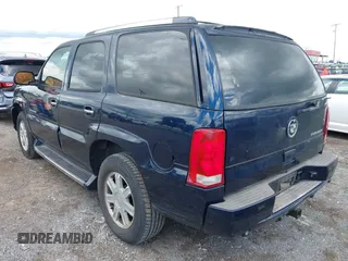 2004 Cadillac Escalade z VIN 1GYEK63N84R211615, wystawiony jako IAAI lot #42394289 z przebiegiem 298 520 mil mil oraz . Historia ofert i sprzedaży dostępna na DreamBid. Obrazek 3.