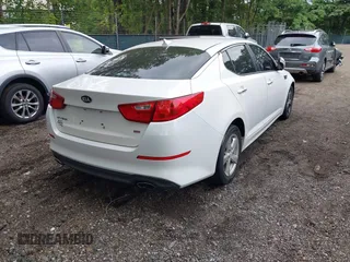 2015 Kia Optima LX with VIN KNAGM4A7XF5599309, listed as a IAAI auction lot 42493215 with 143,703 mi miles and . Bid and sale history available at DreamBid. Image 4.