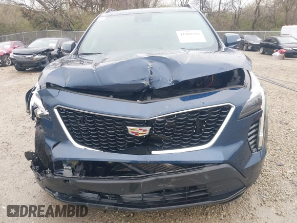 2021 Cadillac XT4 AWD Sport with VIN 1GYFZFR45MF053573, listed as a IAAI auction lot 41909784 with 36,309 mi miles and . Bid and sale history available at DreamBid. Image 6.