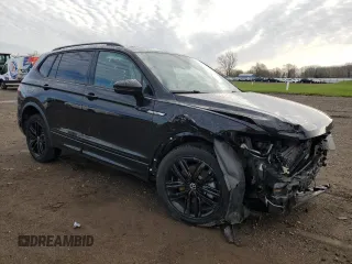 2022 Volkswagen Tiguan SE R-Line Black z VIN 3VV8B7AX9NM088599, wystawiony jako Copart lot #52118695 z przebiegiem 27 836 mil mil oraz Szkody całkowita. Historia ofert i sprzedaży dostępna na DreamBid. Obrazek 4.