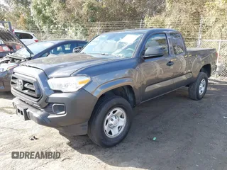 2021 Toyota Tacoma SR with VIN 3TYRX5GN6MT010072, listed as a IAAI auction lot 41730437 with 73,231 mi miles and . Bid and sale history available at DreamBid. Image 2.