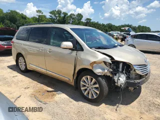 2014 Toyota Sienna XLE with VIN 5TDYK3DC8ES414814, listed as a Copart auction lot 64577875 with 111,675 mi miles and Salvage title. Bid and sale history available at DreamBid. Image 4.