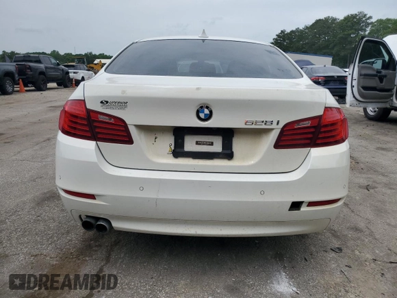 2016 BMW 5 Series 528i xDrive with VIN WBA5A7C5XGG148447, listed as a Copart auction lot 56825455 with 128,800 mi miles and Clean title. Bid and sale history available at DreamBid. Image 6.
