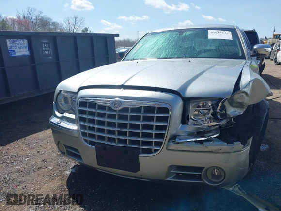 2006 Chrysler 300 C with VIN 2C3LA63H06H105774, listed as a IAAI auction lot 41918634 with 319,232 mi miles. Bid and sale history available at carsss.com. Image 12.